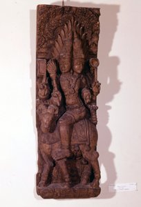 Agni, eldguden, avbildad med två huvuden (bicefal) på en bagge, enligt hinduisk mytologi. Träskulptur från 1600-talet. Paris, Musée Guimet. av Indian School