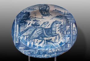 Tallrik dekorerad med kapplöpningshästar och en vapensköld, första hälften av 1700-talet (majolica) av Italian School