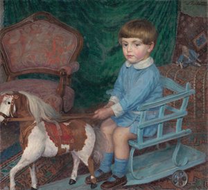 Barn med en hästleksak, ca. 1925.