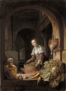 En piga som förbereder grönsaker i ett kök av Jan Adriansz van Staveren