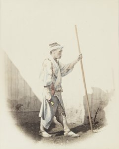 Japansk man med klocka (handfärgat svartvitt foto) av Japanese Photographer