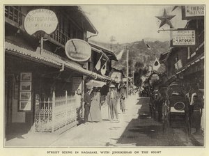 Gatubild i Nagasaki, med Jinrikishas till höger