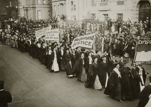 Women in academic dress marching in a suffrage parade in New York City, 1910 