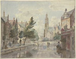 En stenbro över en kanal, en katedral i bakgrunden, en lyktstolpe till höger om huset