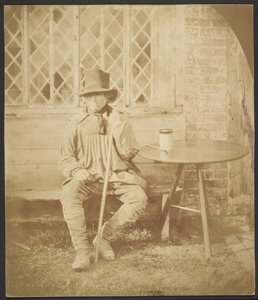 [Man som sitter vid bordet] av John Whistler