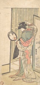 En kurtisan som tittar på sin reflektion i en handspegel, ca. 1787. av Katsukawa Shun