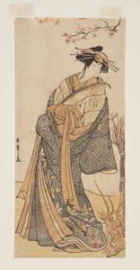 Skådespelaren Segawa Tomisaburo II som en lång kurtisan som står i ett rum (trätryck i färg) av Katsukawa Shunsho