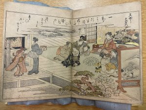 En sida från Gifts from the Ebb Tide av Kitagawa Utamaro