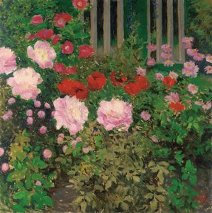 Blommor och trädgårdsstaket; Blommande blommor på trädgårdsstaketet
