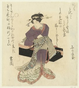Geisha knyter bältet av Kurizono