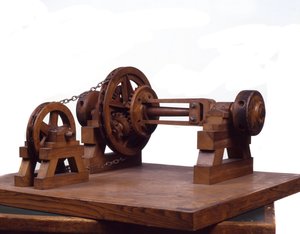 Trämodell (modell) av kugghjul och hjul är baserad på designen av Leonardo da Vinci (Leonard de Vinci) (1452-1519) Museum of Science and Technology, Milano.