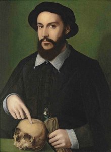 Porträtt av en man som pekar på en dödskalle av Master of the 1540s