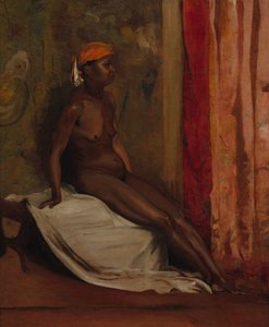 Sittande afrikansk kvinna