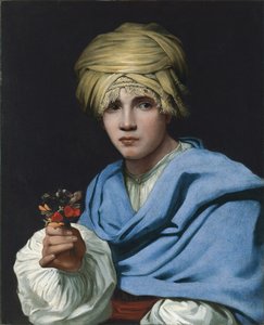 Pojke i en turban som håller en nosegay