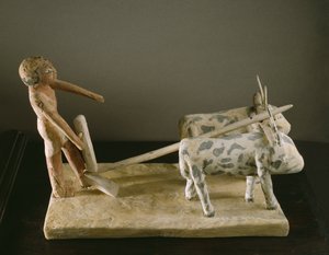 Begravningsmodell av en plogman som leder sin plog tecknad av två oxar (målat trä)
