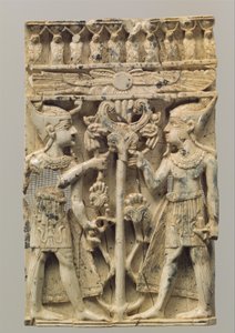 Möbelplakett snidad i hög relief med två egyptiska figurer som flankerar ett volutträd, ca 900-800-talet f.Kr. (elfenben) av Neo Assyrian