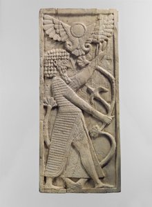 Möbelplakett snidad i relief med en mansfigur som greppar ett träd, c.800-talet f.Kr. (elfenben)