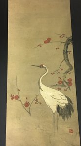 Röd plommonkvist och en trana av Ogata Kenzan
