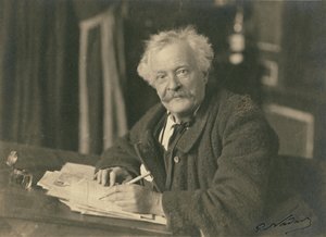 Félix Nadar sittande vid skrivbordet av Paul Nadar