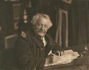 [Félix Nadar sitter vid ett skrivbord] av Paul Nadar