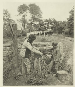 På Grindstone-A Suffolk Farmyard av Peter Henry Emerson