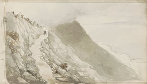 Figurer på en stig längs en stenig kust