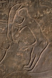 Människofigur och tjurhuvud (hällristning) av Prehistoric