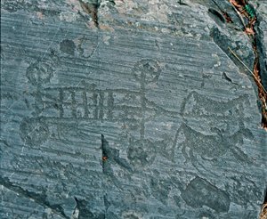 Förhistoria: Camunni civilisation: en vagn avfyrad av hästar, hjul är representerade med ekrar och hästar är i profil i ett försök att prospektera. Bergstick av sten 23 av Naquane (Valcamonica, Val Camonica, Brescia). Period mellan neolitikum och bro av Prehistoric Prehistoric