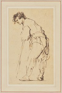 Ung man lutar sig på en pinne av Rembrandt Harmensz. van Rijn