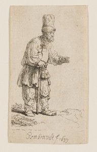 En bonde i hög mössa, stående och lutad mot en käpp av Rembrandt van Rijn
