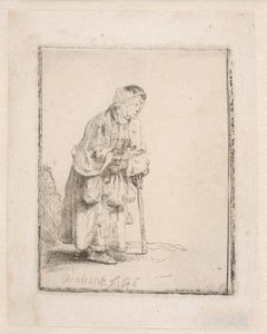 En tiggarkvinna som stöder sig på en käpp av Rembrandt van Rijn