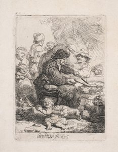 En kvinna som steker pannkakor av Rembrandt van Rijn