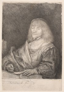 Man vid ett skrivbord, med ett kors och en kedja av Rembrandt van Rijn