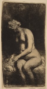 Naken kvinna sittande på en bänk med en kudde (Kvinna som tvättar fötterna vid en bäck) av Rembrandt van Rijn