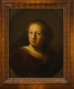 Porträtt av en kvinna med ett rubinberlock av Rembrandt van Rijn
