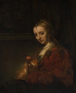 Kvinna med en rosa, tidigt 1660-tal. av Rembrandt van Rijn
