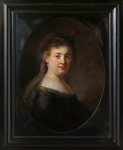 Ung kvinna i fantasidräkt av Rembrandt van Rijn