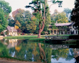 Drottningens hus i Hamlet drottning Marie Antoinette, i parken vid Chateau de Versailles.