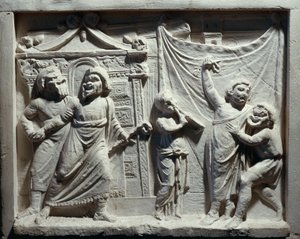 Relief av teaterscen från komedin 