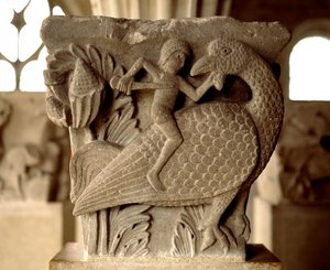 Representation av en strid mellan en man och en fågel (kapitlets huvudstad) av Romanesque