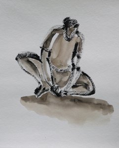En eftertänksam, hukande figur av Santhosh ch