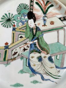 Kinesisk konst: damen rewers på en bänk. Målning på porslin från 1700-talet. Paris, Guimet-museet, Nationalmuseet för asiatisk konst av School Chinese