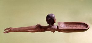 Egyptisk antik: Träsked för kosmetisk sked som kallas en naken simmare som håller i en anka. 18:e dynastin, nytt imperium. Paris, Louvren