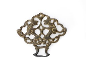 Prydnad med ett par lejon, Seljud dynasti, möjligen 1200-tal (brons med spår av förgyllning)