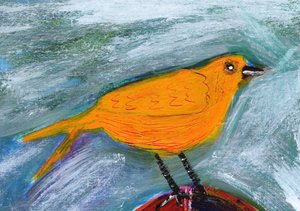 En färgstark orange fågel
