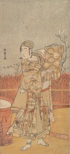 Skådespelaren Sawamura Sojuro III håller upp ett stycke brokad, sent 1700-tal. av Shunsho
