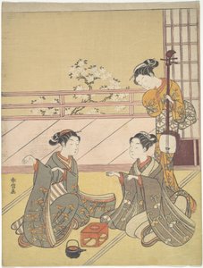 Unga kvinnor som spelar kitsune-ken (rävspelet) av Suzuki Harunobu