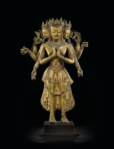 Ekadashalokeshvara statue av Tibetan School