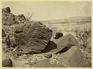 Sten utskuren av drivande sand, nedanför Fortification Rock, Arizona av Timothy O