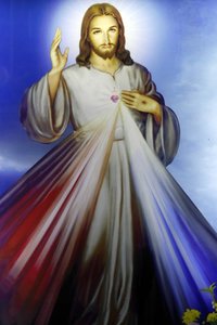 Butik som säljer religiösa kristna föremål. Barmhärtige Jesus, jag litar på dig. Ho Chi Minh City. Vietnam av Unbekannt